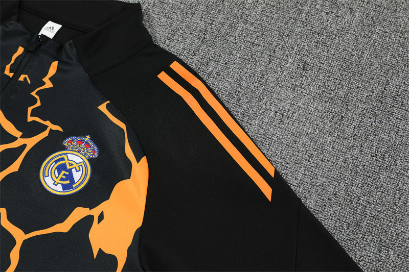 RM Marvel 25/26 Black Tracksuit featuring a yellow lightning