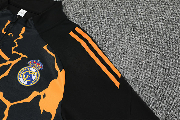RM Marvel 25/26 Black Tracksuit featuring a yellow lightning