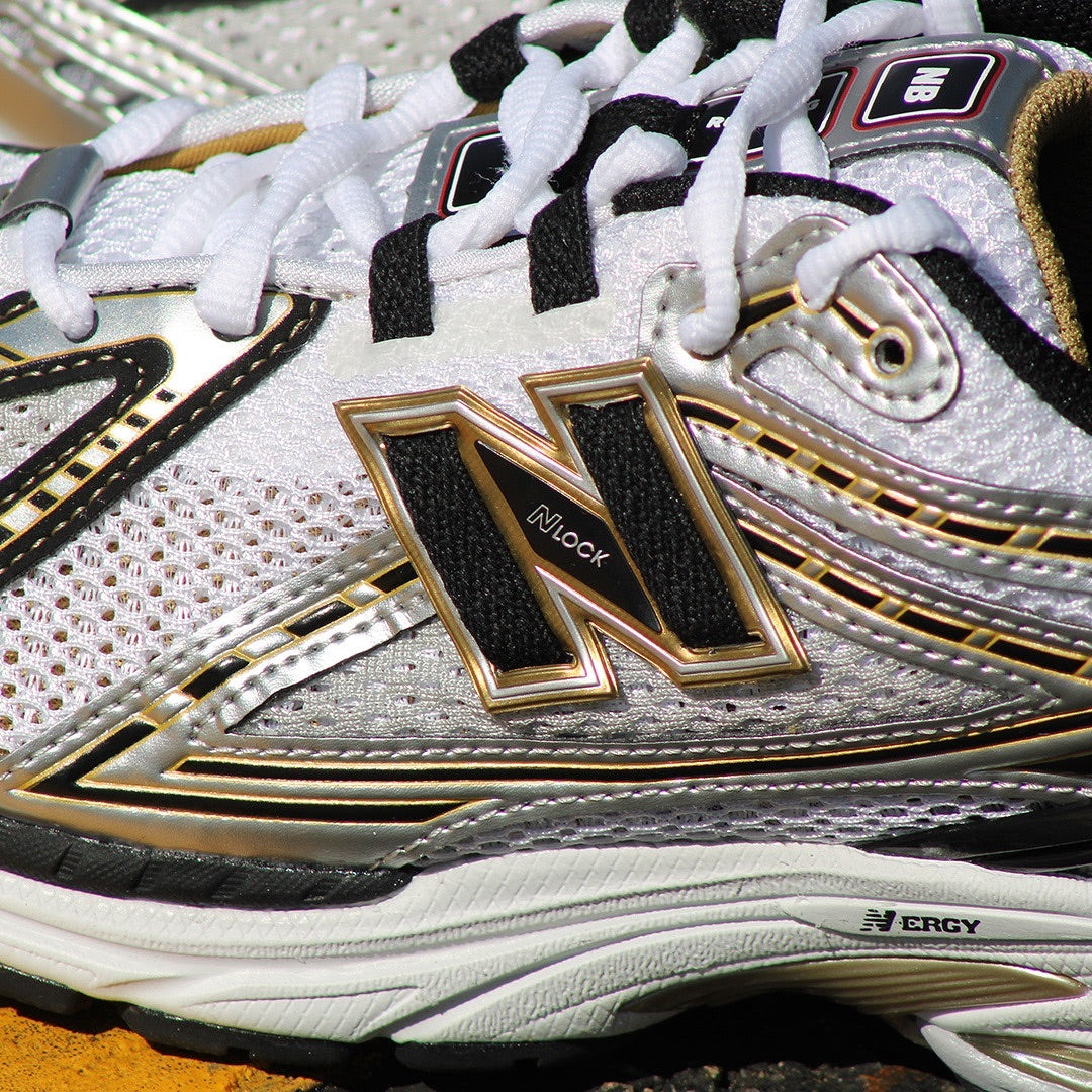 New Balance 1906 silver and gold
