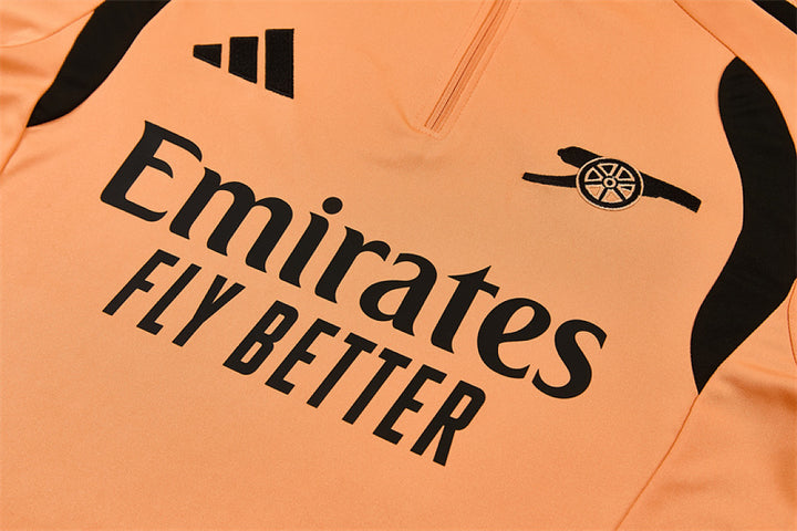 Arsenal Orange Training Tracksuit 2027 - Emirates front and cannon detail