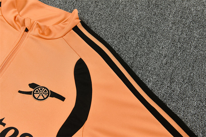 Arsenal Orange Training Tracksuit 2027 - embroidered cannon crest