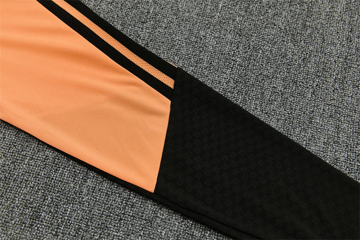 Arsenal Orange Training Tracksuit 2027 - pants stripe detail