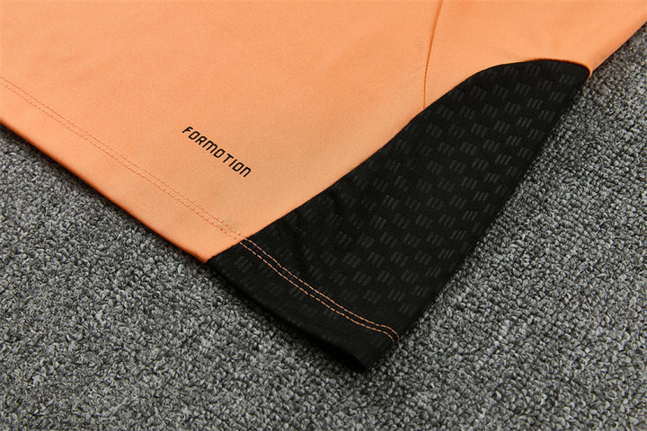 Arsenal Orange Training Tracksuit 2027 - FORMOTION hem detail