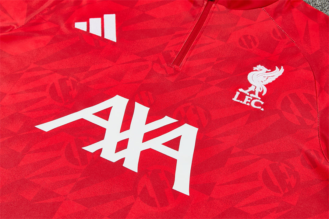 AXA sponsor print and Liverpool crest detail on red training top