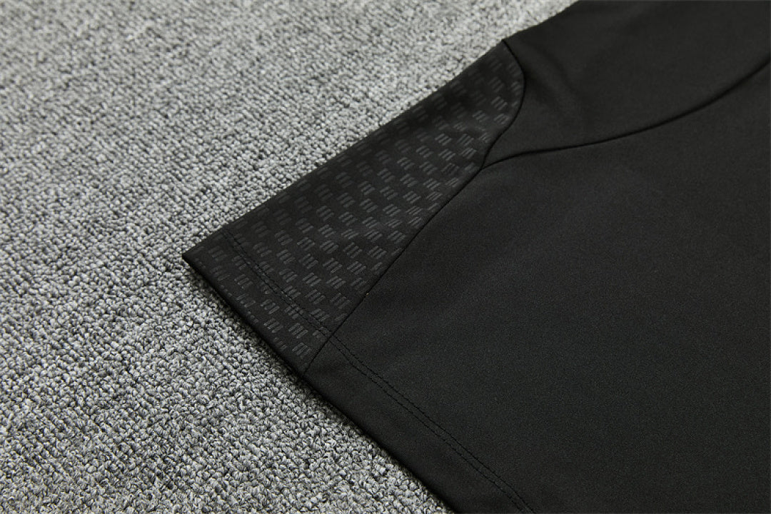 Hem and side panel detail Manchester United black tracksuit